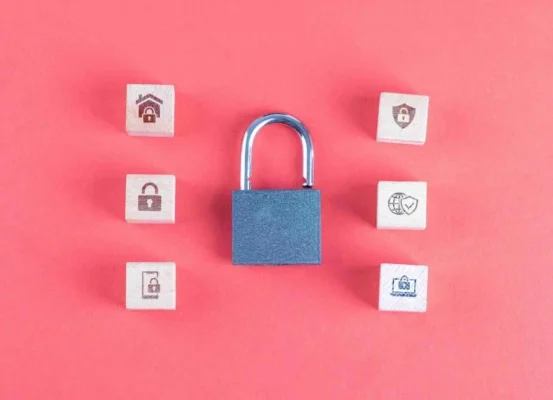 Padlock surrounded by security icon blocks, representing brand protection